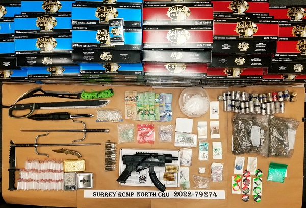 Surrey RCMP Arrest 9 People And Seize Drugs, Cash And A Loaded Gun